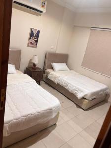 Katil atau katil-katil dalam bilik di شقة مفروشة