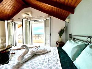 Postel nebo postele na pokoji v ubytování Maisonette Ralia