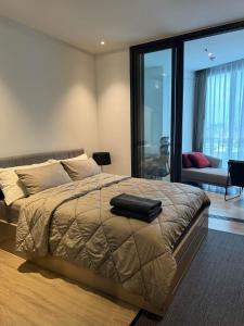 Кровать или кровати в номере Apartment in Muang Pattaya