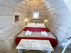 Postel nebo postele na pokoji v ubytování Trullo fiore