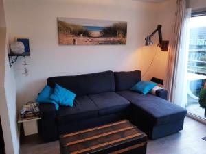 Et opholdsområde på Amelanderkaap 31 met zwembad