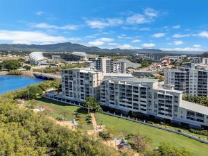 an aerial view of a city with buildings at City Stadium Apartment on the Riverfront 38 in Townsville