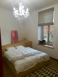 Cama ou camas em um quarto em Art deco new apartment in the centre of Riga