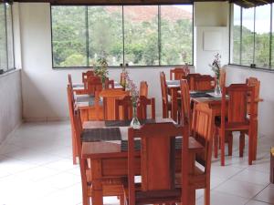 En restaurant eller et andet spisested på Pousada Antigo Caminho Do Ouro