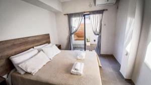 Postel nebo postele na pokoji v ubytování Alojamientos Litoral - Dpto España III