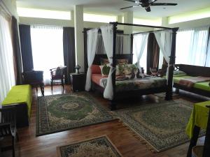 O zonă de relaxare la Rumah Singa, Villa 1 Andaman Hills, Langkawi +127 fotografii
