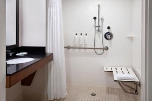 a bathroom with a sink and a shower at Fairfield by Marriott Inn & Suites Wallingford New Haven in Wallingford