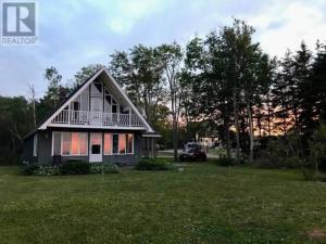 Zahrada ubytování Borgitte 3 bedroom Waterfront Cottage