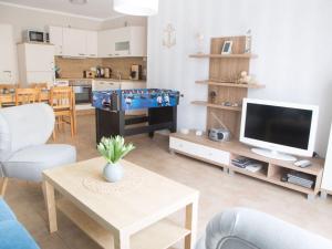 TV a/nebo společenská místnost v ubytování in Stralsund Comfortable holiday residence
