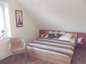 En eller flere senge i et værelse på Sommerhus Funen Comfortable holiday residence