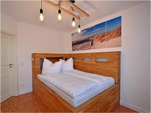 En eller flere senge i et værelse på Villa Böck 9 Comfortable holiday residence