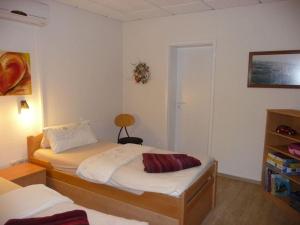 Ένα ή περισσότερα κρεβάτια σε δωμάτιο στο Eldeufer Comfortable holiday residence