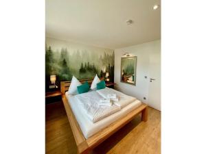 En eller flere senge i et værelse på Holiday apartment Harz holiday