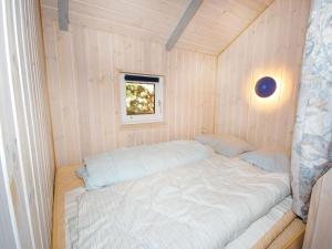 Llit o llits en una habitació de House Fjord View KM35A
