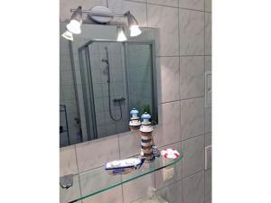 Et badeværelse på Villa Rosa 6 - Seagull's Nest + 12 billeder