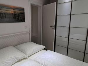 En eller flere senge i et værelse på Morning sun Comfortable holiday residence