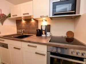 Η κουζίνα ή μικρή κουζίνα στο Naturdüne 8 Comfortable holiday residence