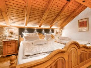 Ένα ή περισσότερα κρεβάτια σε δωμάτιο στο Holiday apartment Kirchberger