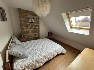 Postel nebo postele na pokoji v ubytování T4 cosy style montagnard 6/8pers