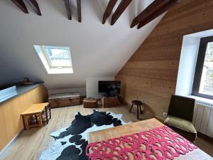 TV a/nebo společenská místnost v ubytování T4 cosy style montagnard 6/8pers