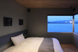 Voodi või voodid majutusasutuse torch amano-hashidate toas