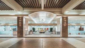 a lobby of a hotel with a large ceiling at Ocean View Room at Ala Moana Hotel- Fees include in Honolulu +19 photos