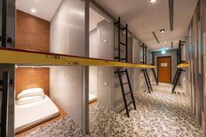 凝萃文旅 台中車站店 NCH-Business Hotel客房内的一张或多张床位