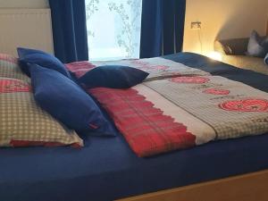 Ένα ή περισσότερα κρεβάτια σε δωμάτιο στο Huis Berta 2-4P