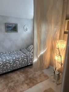 Кровать или кровати в номере Small guest room