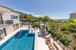 an image of a swimming pool at a villa at Luxury Villa My Wish with Pool in Kastel Stari