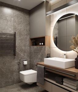 een badkamer met een wastafel, een toilet en een spiegel bij Book airport in Arnavutköy