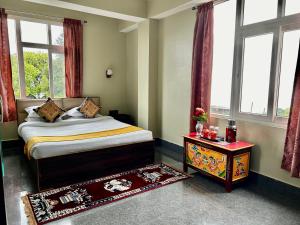 Khimsa Lodge客房内的一张或多张床位