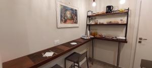 a room with a desk with a chair in it at L'Étoile luxury b&b in Tropea