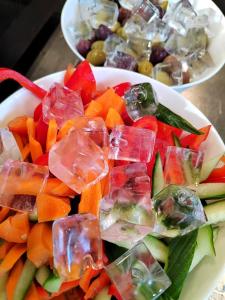 a white bowl filled with different types of vegetables at Best Western Hotel Spinnerei Linz in Linz