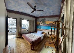 A bed or beds in a room at Hotel Hakoniwa