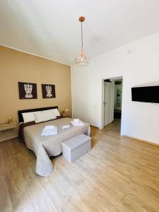 Giường trong phòng chung tại Casa Akragas +4 ảnh