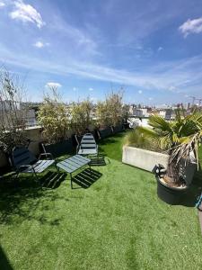 Zahrada ubytování La Terrasse Parisienne - Vue Tour Eiffel + 29 fotografií