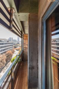 a balcony of a building with a view of a city at 8th On Western Cityscapes at Hallmark House - Zero Loadshedding in Johannesburg