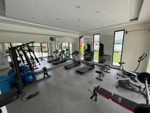 a gym with a lot of treadmills and machines at SA Apartments! 1bd Flat 300m to the Beach in Alanya