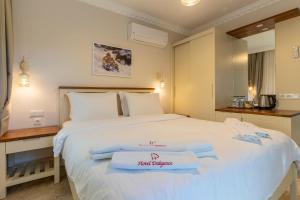 Postel nebo postele na pokoji v ubytování HOTEL DALYANCE