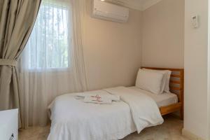 Postel nebo postele na pokoji v ubytování HOTEL DALYANCE