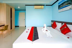 Postel nebo postele na pokoji v ubytování Mala Hotel