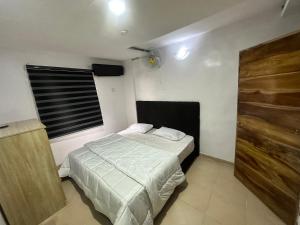Tempat tidur dalam kamar di Port punta