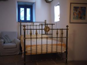 Postel nebo postele na pokoji v ubytování Andros Stone Sea View Villa