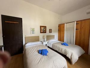Łóżko lub łóżka w pokoju w obiekcie Casa Rural Navalonguilla con piscina