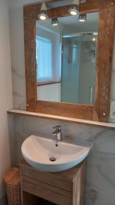 Koupelna v ubytování Maison Andro + 8 fotografií