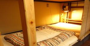 Tempat tidur dalam kamar di 44-49 Bishamoncho - Hotel / Vacation STAY 7930