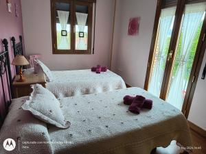Postel nebo postele na pokoji v ubytování Casa Rural Casa Jacinta