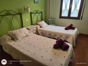Postel nebo postele na pokoji v ubytování Casa Rural Casa Jacinta