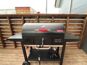 a grill sitting on a table on a patio at Mint / 11min walk to Noboribetsu st in Noboribetsu